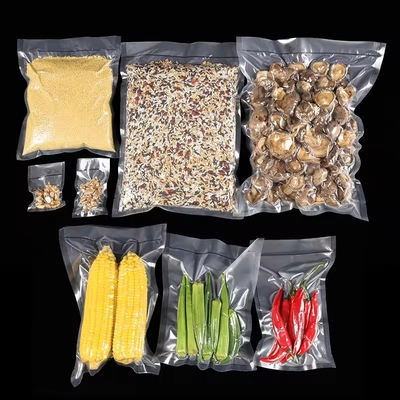 Emballage sous vide transparent Emballage en nylon en relief Sac d'emballage à conserver frais Produits alimentaires et fruits Surface d'impression gravure