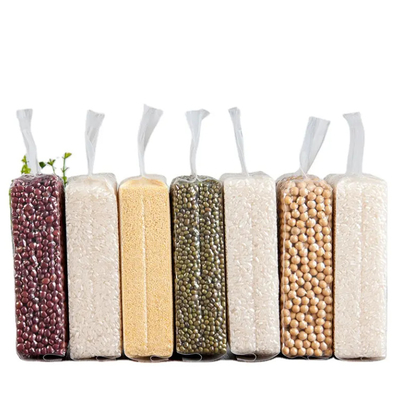 Sacs d'emballage en plastique de nylon transparent bon marché avec étanchéité de coussinet latérale solide 1 kg/100 kg Sacs d'emballage sous vide pour les aliments à base de riz