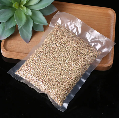 Pour conserver les aliments frais Sacs à vide étanches à la nourriture Sacs à vide étanches à la nourriture Sacs et rouleaux de film pompage à sec et sacs transparents imperméables à l'humidité