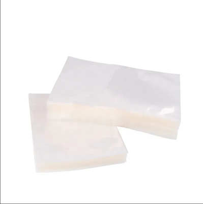 En stock et personnalisé Clear Transparent Nylon PE Laminé plastique stockage alimentaire de l'emballage de la chambre de vide