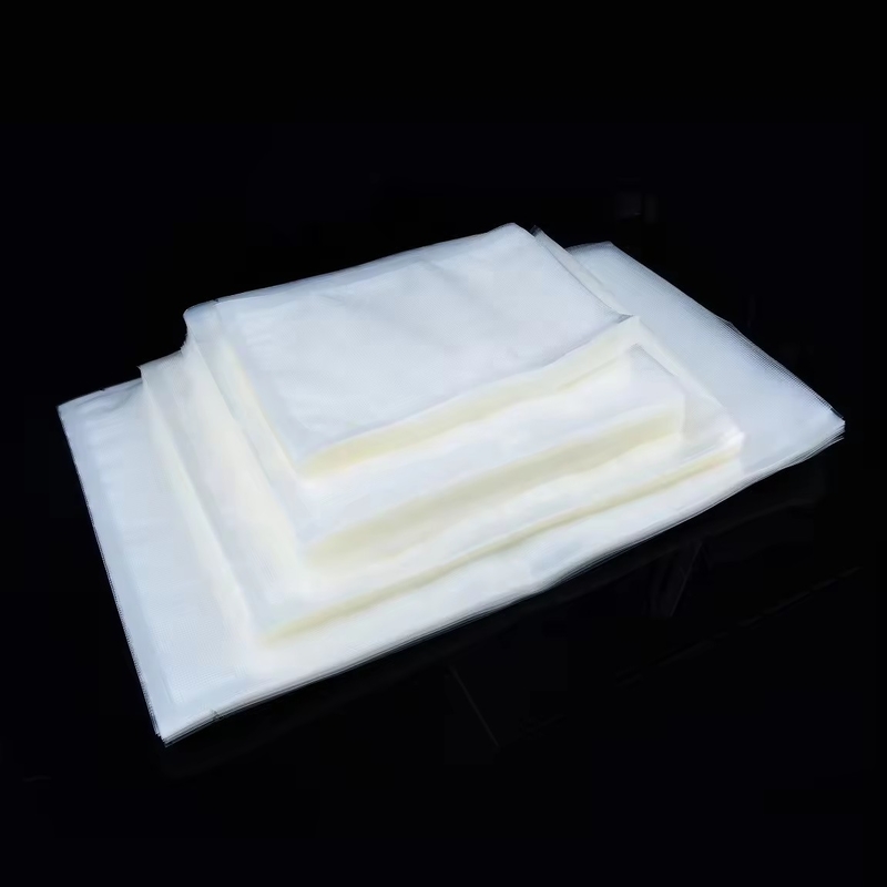 Sacs d'étanchéité en relief sous vide transparents pour les aliments économes Emballage en plastique nylon Grand sac d'étanchéité sous vide transparent
