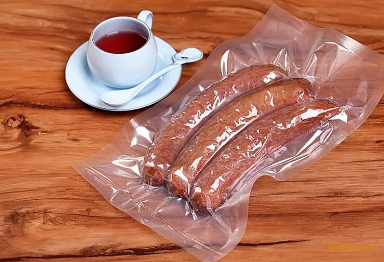 Pour conserver les aliments frais Sacs à vide étanches à la nourriture Sacs à vide étanches à la nourriture Sacs et rouleaux de film pompage à sec et sacs transparents imperméables à l'humidité